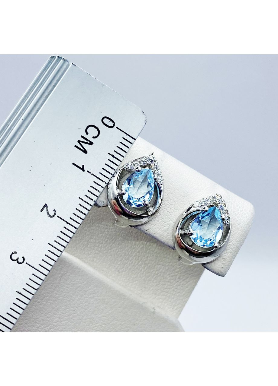 Сережки срібні з блакитним топазом і кубічним цирконієм 4,55 г No Brand (369737622)