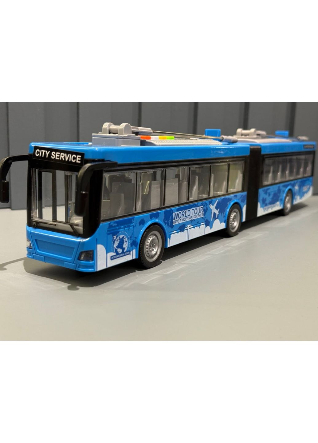 Тролейбус інерційний зі світлом та звуком механічне відчинення дверей масштаб 1:16 гумові колеса Блакитний (WY915A/B) WenYi (367191341)