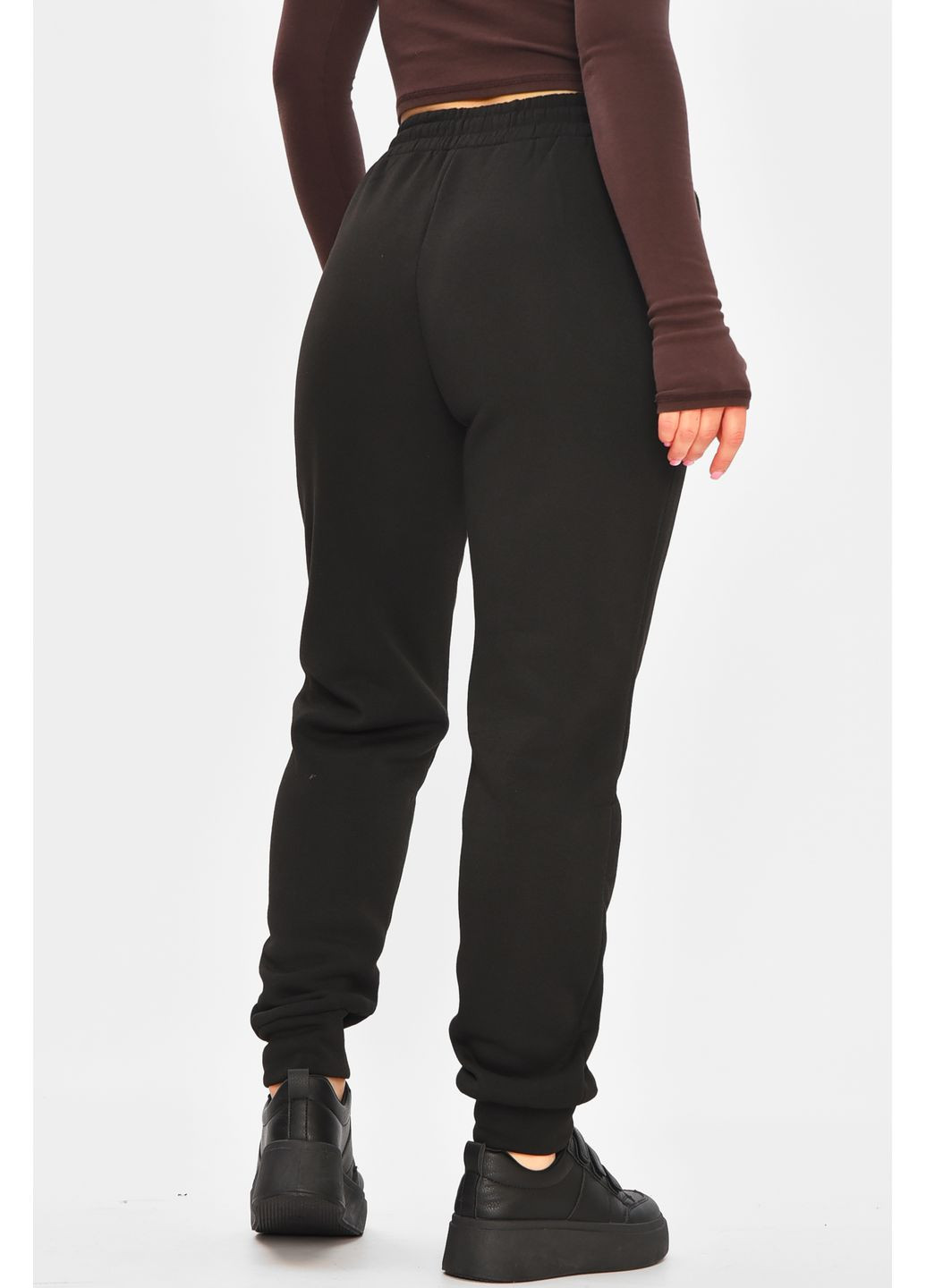 Спортивні жіночі штани на флісі чорного кольору Let's Shop (364485122)