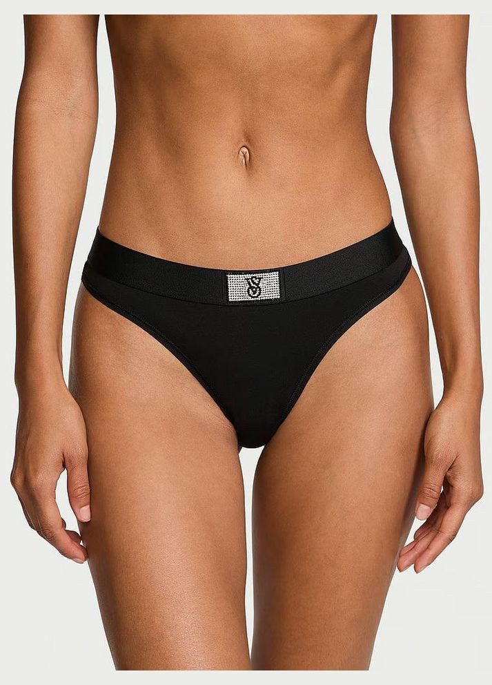 Трусики-стрінги жіночі бавовняні з лого Logo Cotton Shine Patch Thong Panty чорні Victoria's Secret (361072738)