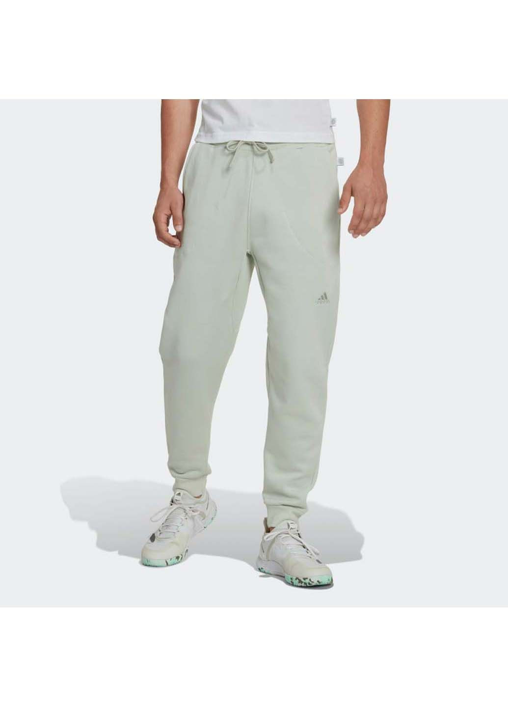 Светло-зеленые демисезонные брюки adidas
