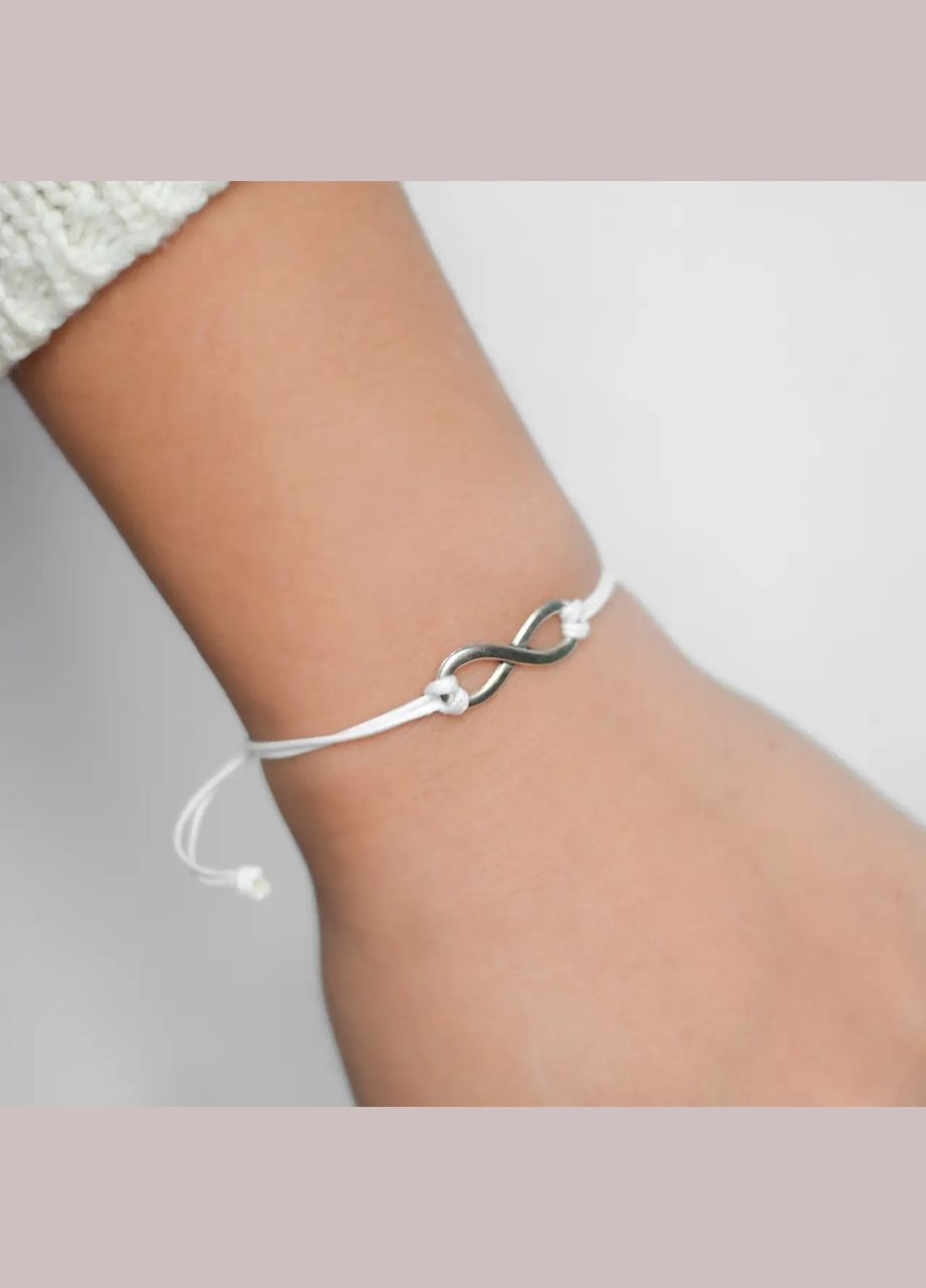 Браслет "Бесконечность" белый на затяжке безразмерный цвет серебро No Brand Браслет (316091287)