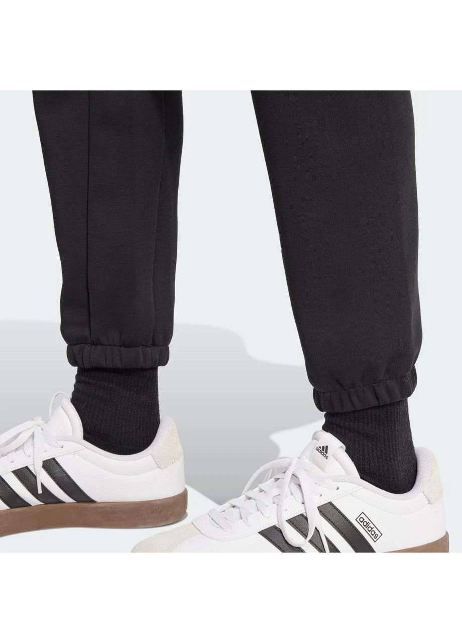 Черные демисезонные брюки adidas