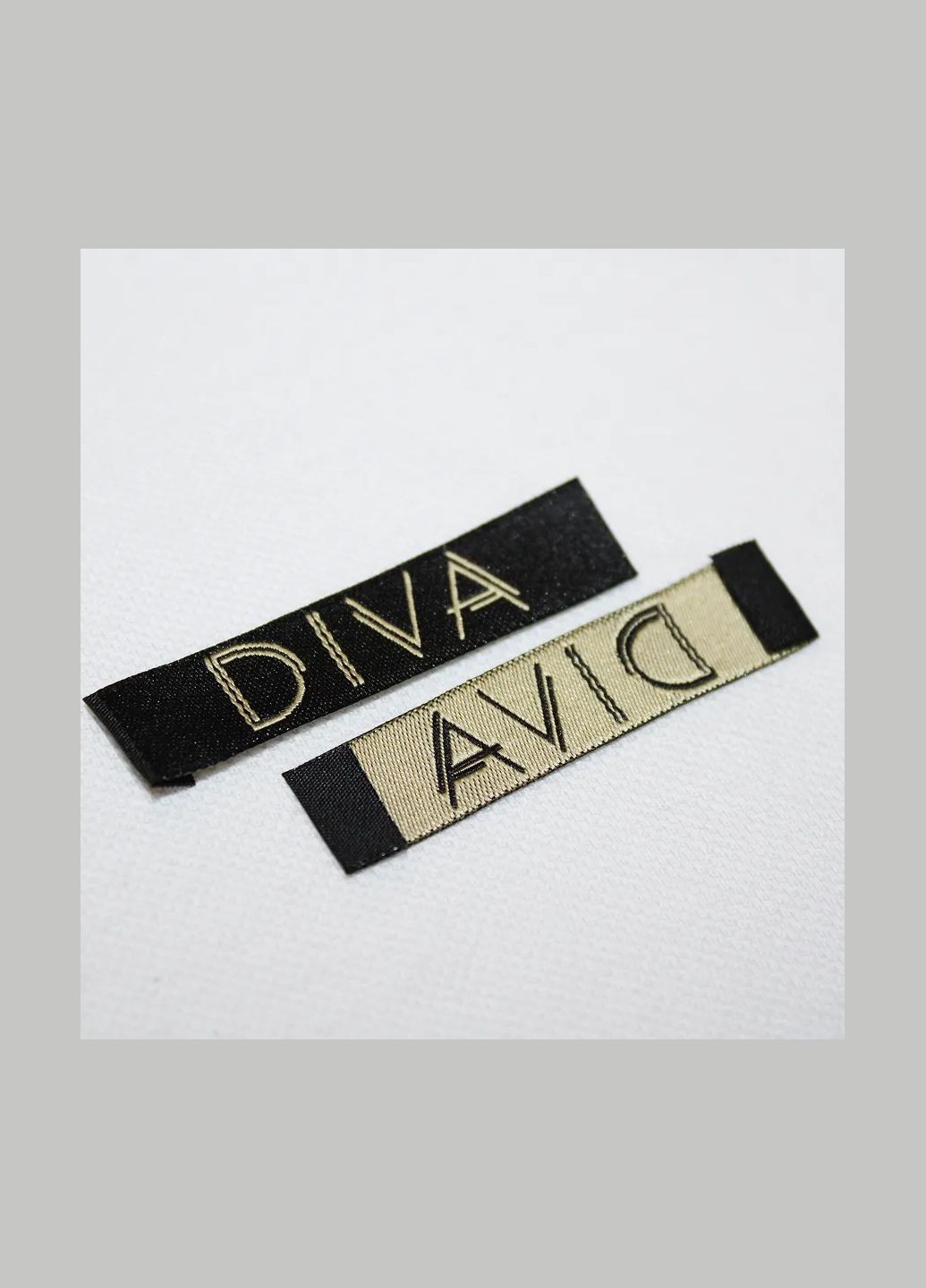 Бирка жаккардовая "Diva" черного цвета с золотым лого (7690) No Brand (335810843)