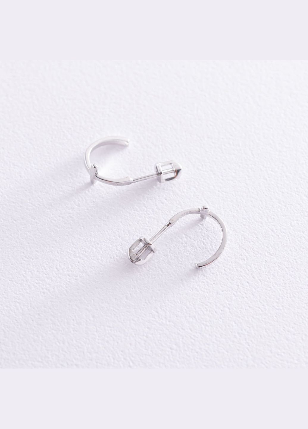 Сережки - пусети Хрестики в білому золоті с07012 Oniks (264025301)