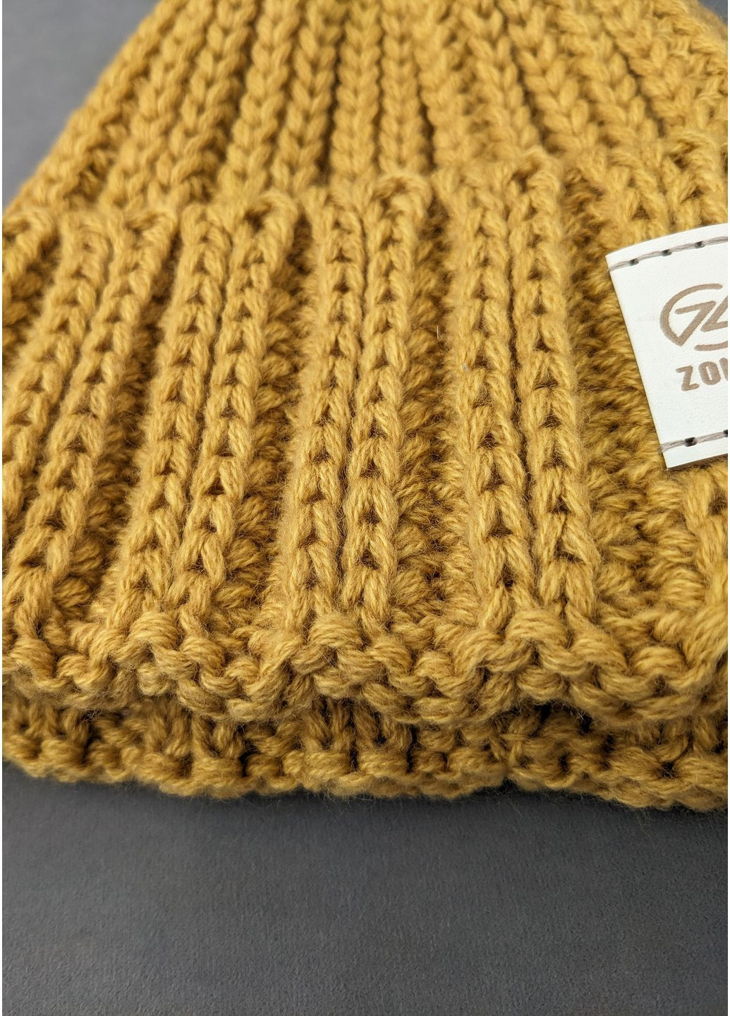 Тепла стильна в'язана шапка на флісі InFashion Шапка (369924137)