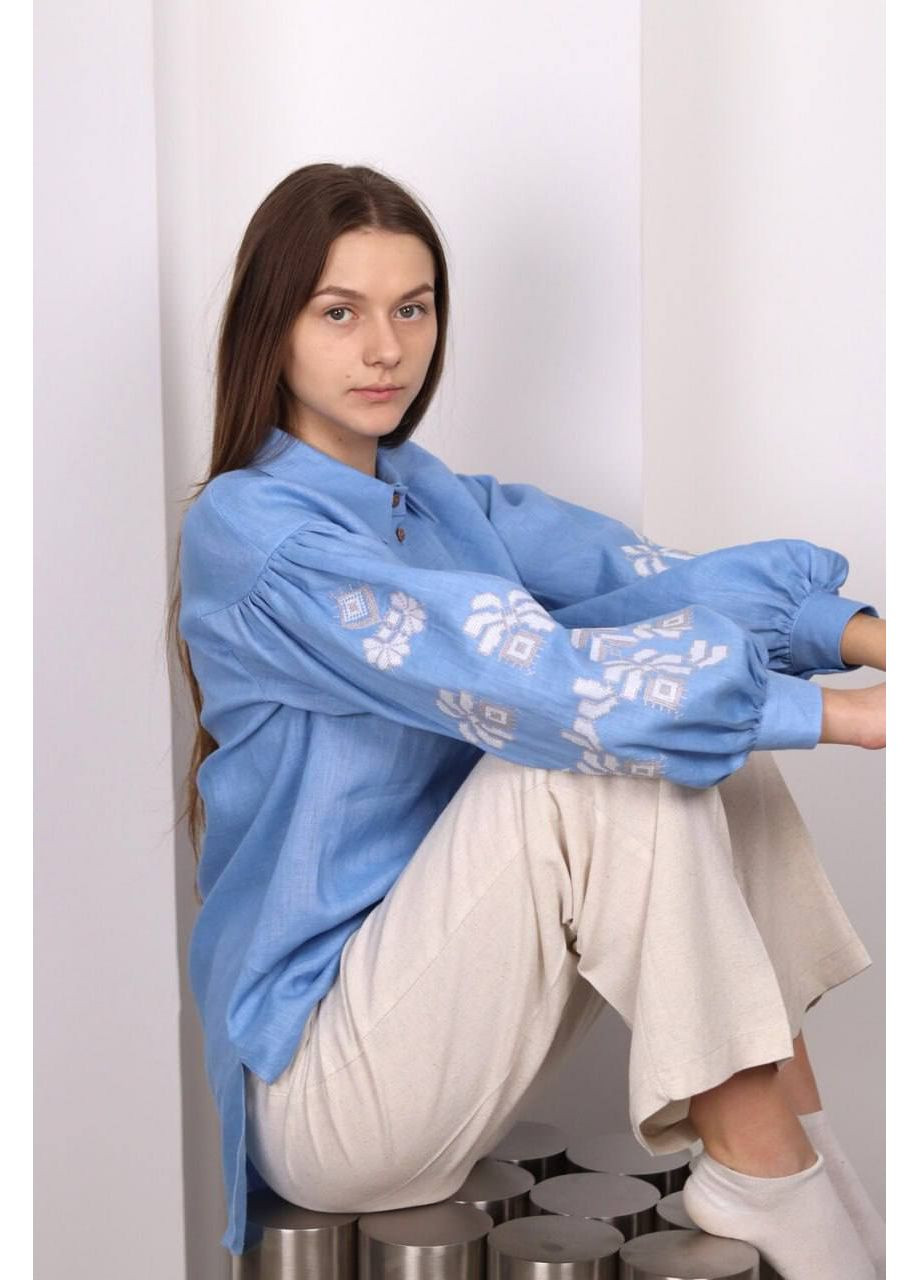Блакитна жіноча вишита блуза на гудзики жоржина блакитна MOTYV візерунок квітковий льон (365957013)