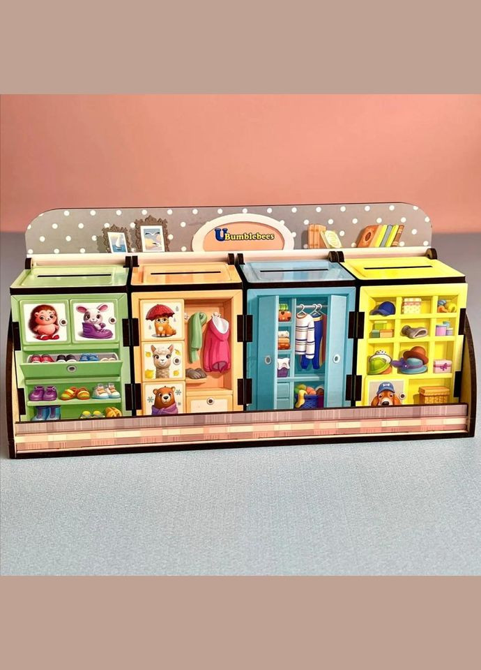 Дерев'яна настільна гра "Шафи з одягом" Ubumblebees (ПСД061) PSD061 сортер-комодик No Brand (330609519)