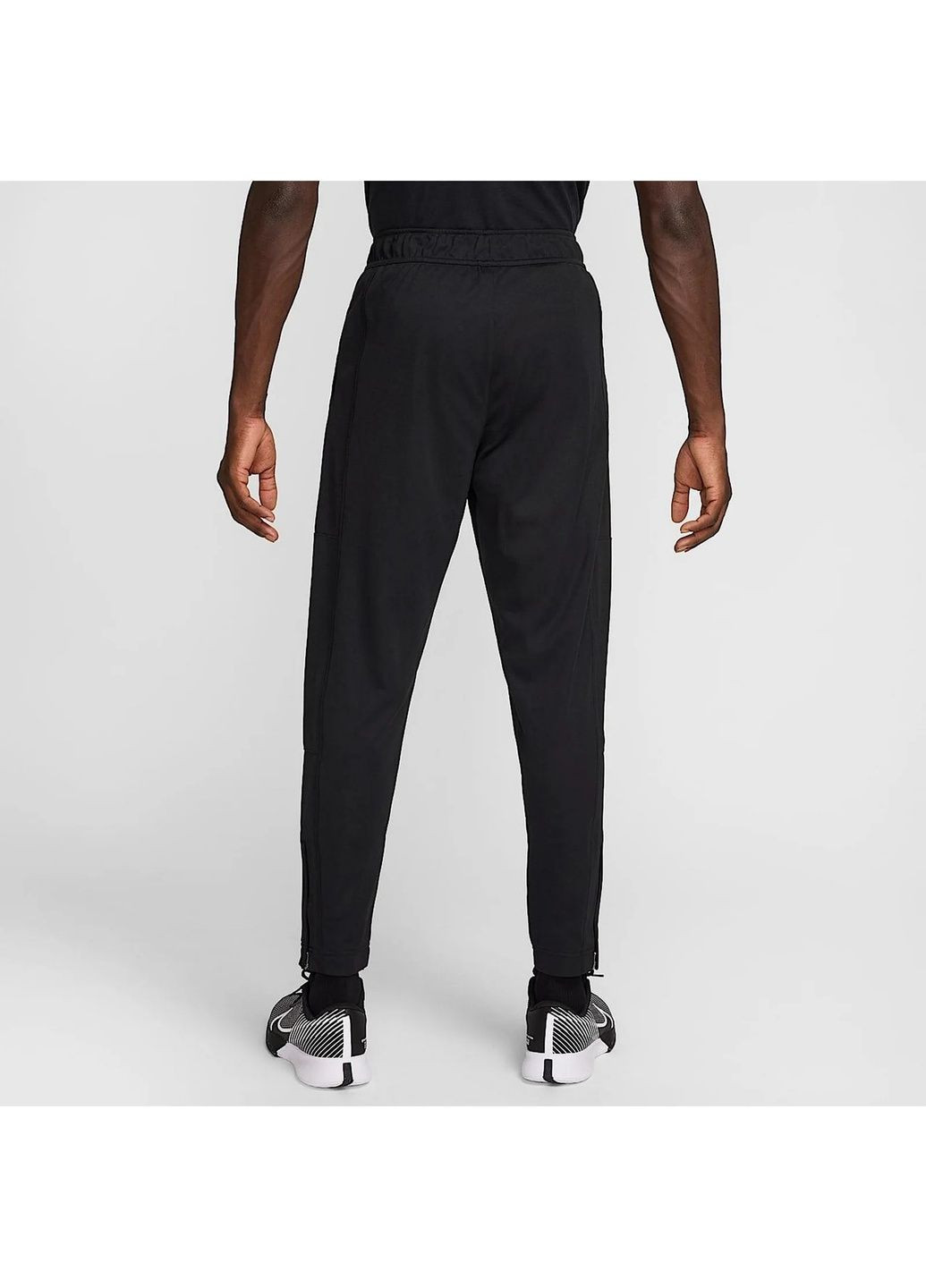 Черные демисезонные брюки Nike