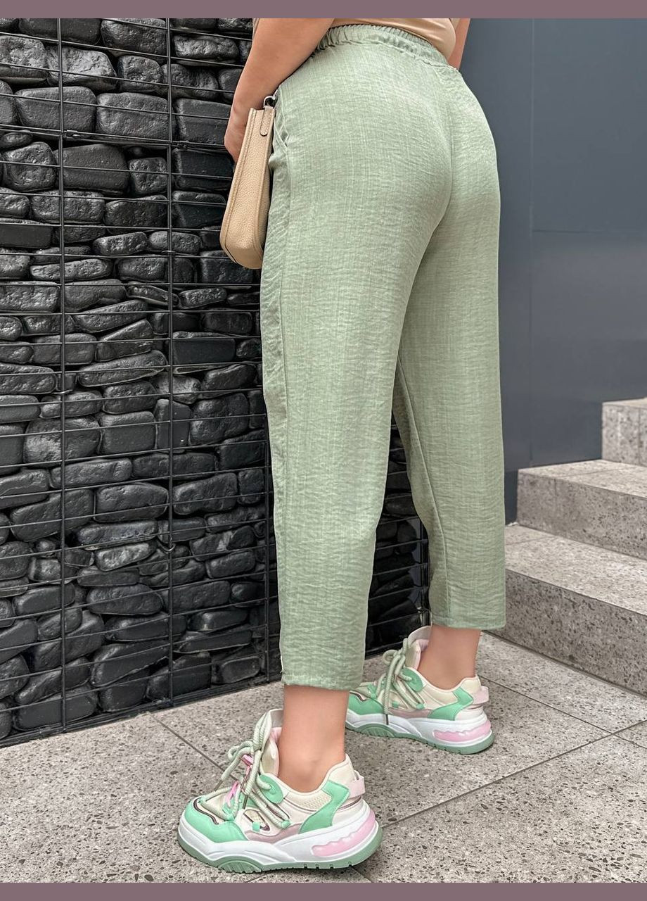 Жіночі брюки мом колір оливка р.50/52 454482 New Trend (290111623)