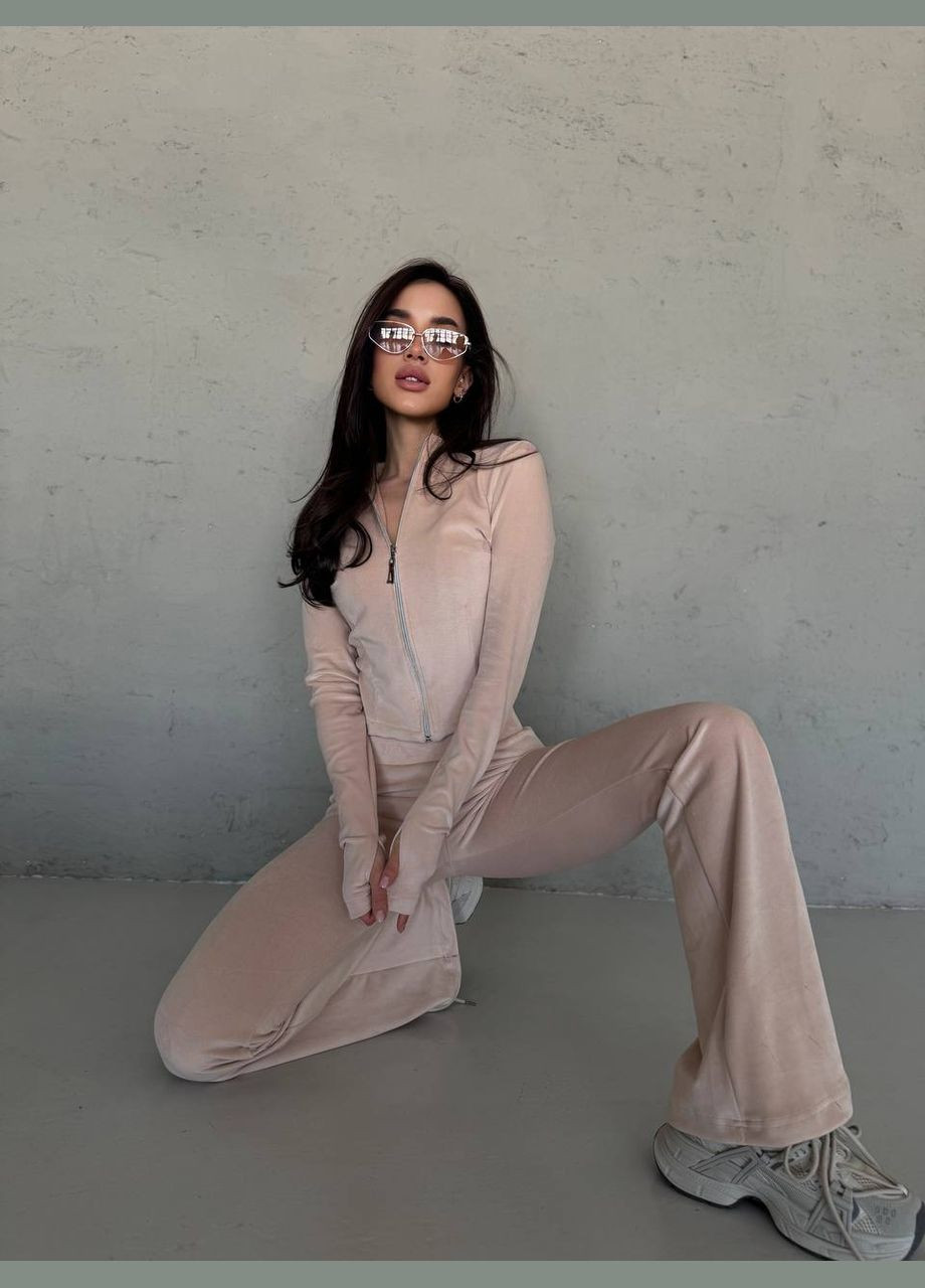 Женский костюм в спортивном стиле укороченная кофта + брюки клеш MonCher (331332567)