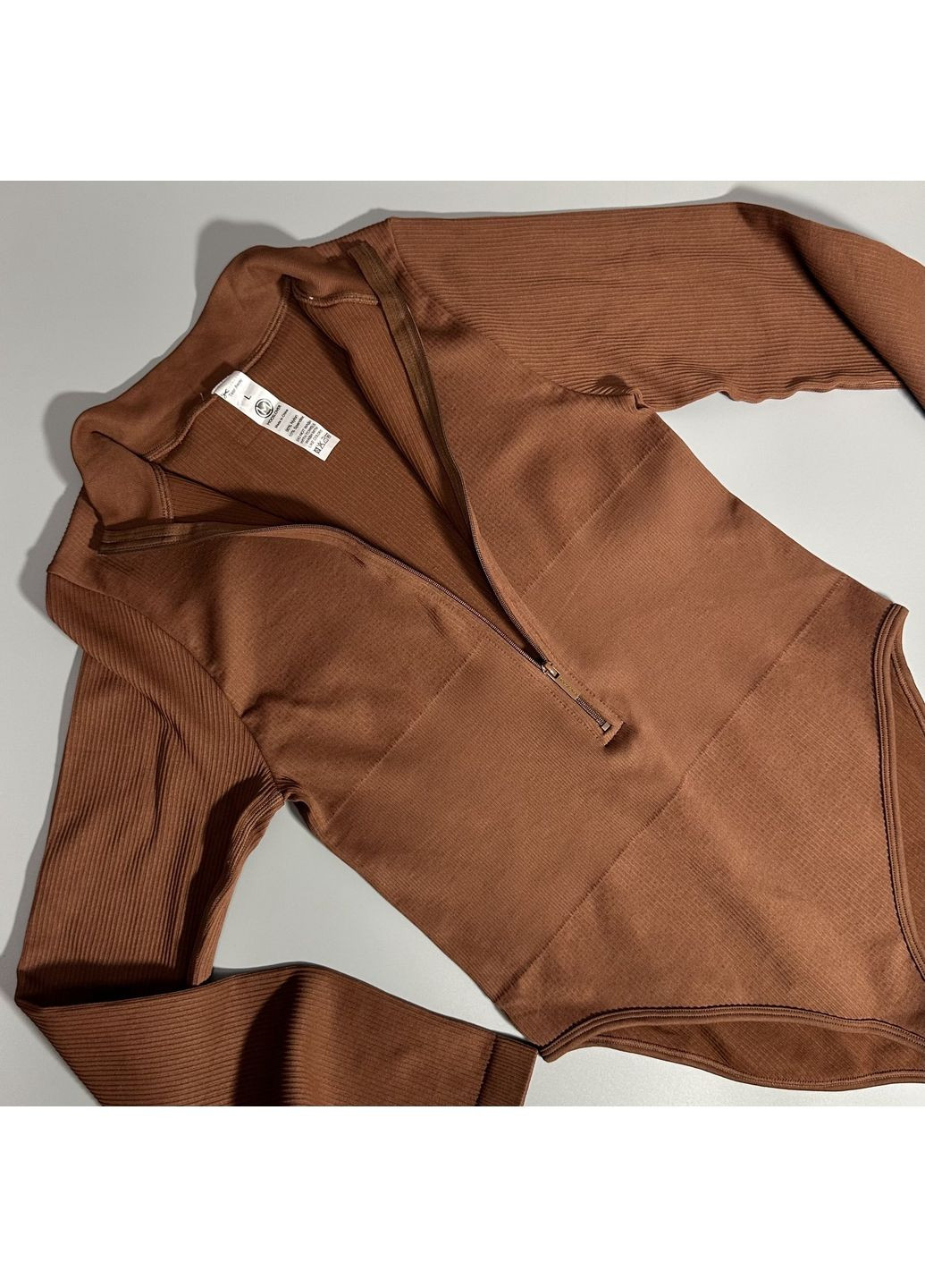 Жіноче спортивне боді з довгим рукавом у рубчик No Brand (354830598)