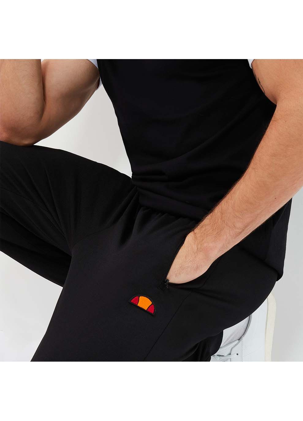 Черные демисезонные брюки Ellesse