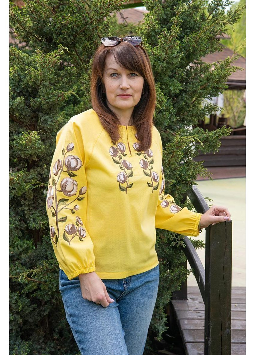 Жовта жіноча лляна блуза жовтого кольору з вишивкою білої бавовни на рукавах і грудях в етно стилі, m льон (301033943)