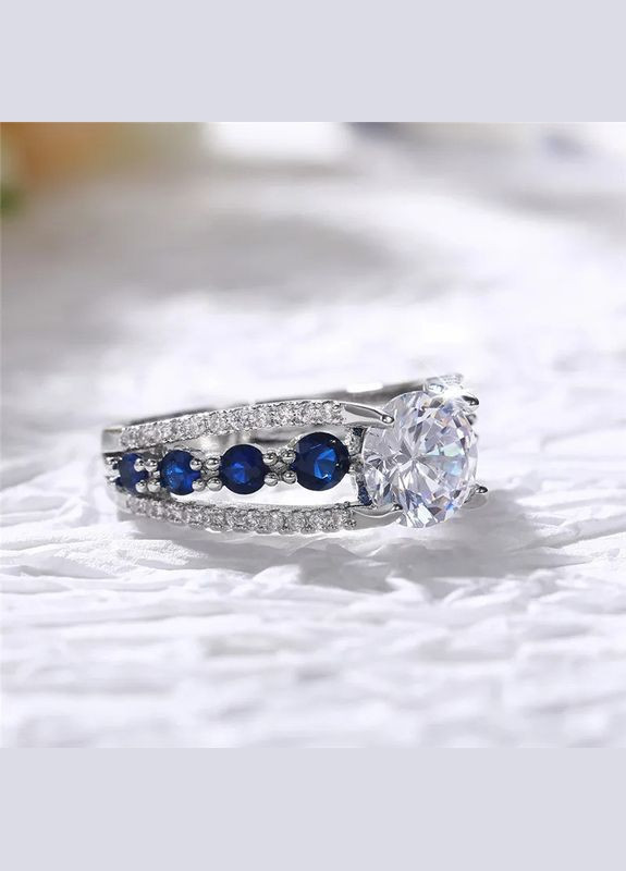 Каблучка жіноча з білими та синім фіанітами Сьюзі срібляста розмір 17 Fashion Jewelry (286762125)