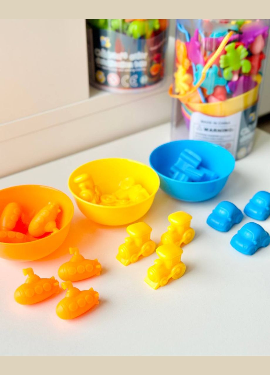 Розвиваюча гра Сортер Монтессорі по кольорам FD2188 з пінцетами та тарілочками Транспорт Fun Game (327797192)