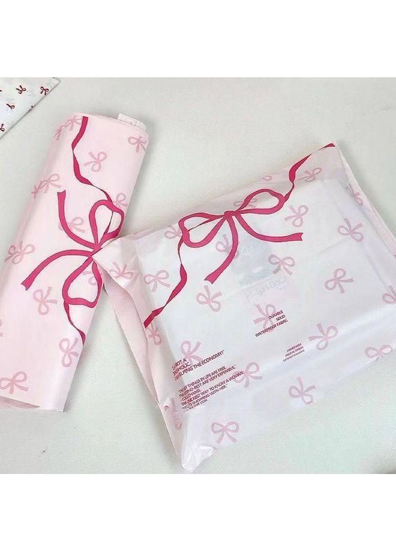 Кур'єрські пакети рожеві з бантом 28×43 см, поліетиленові пакети для відправлень, самоклеючі No Brand (366890490)