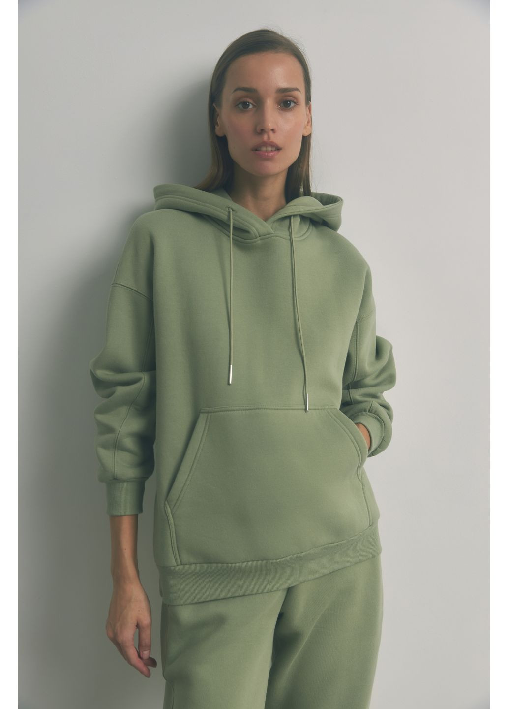 Салатовое демисезонное Женское пальто Йораль 140961 Stimma