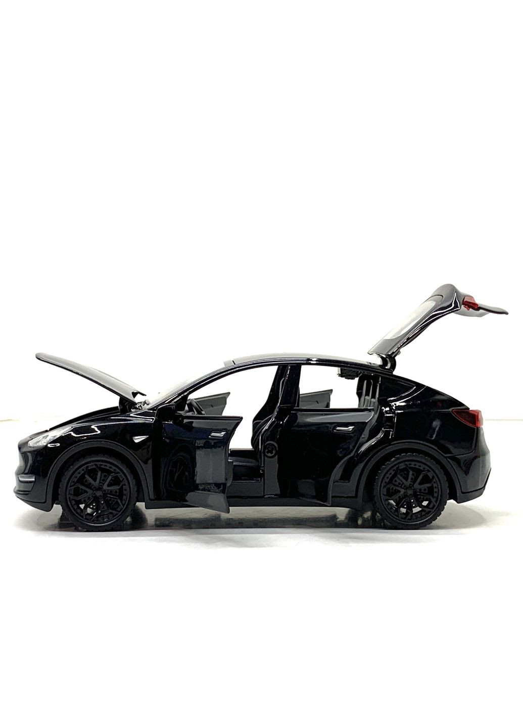 Машина Автосвіт Tesla Model Y інерційна відчиняються двері капот багажник 16см Чорна (AP-1968) No Brand (302215285)