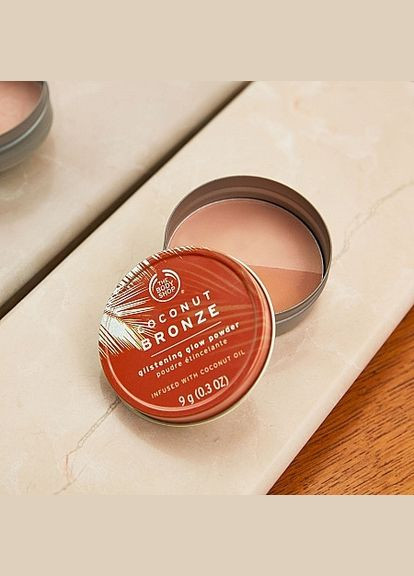 Хайлайтер с бронзовым эффектом "Кокос" Coconut Bronze Glistening Glow Powder 9g (1176656-10592803) The Body Shop (368649930)