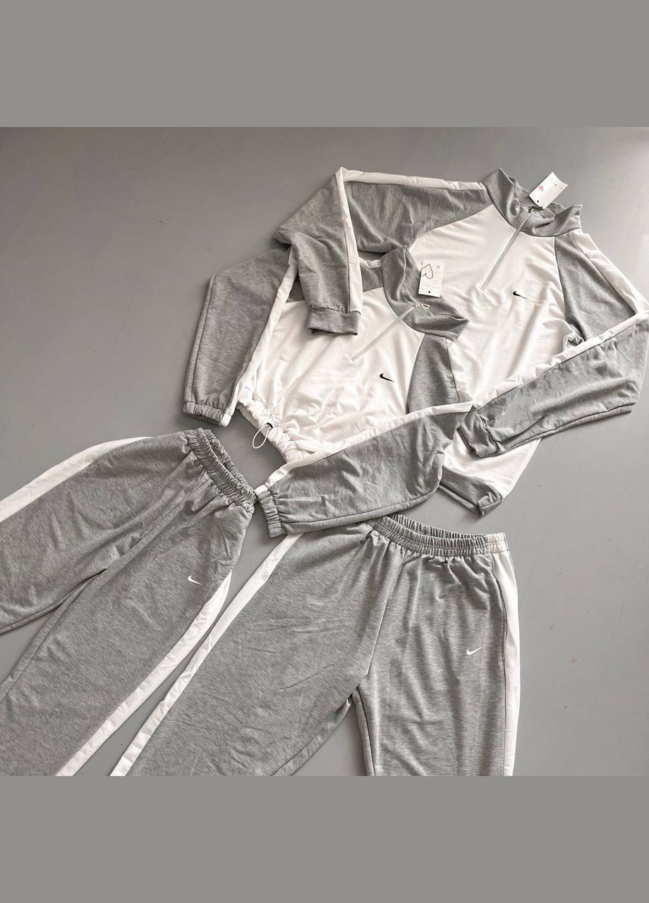 Светло-серый демисезонный стильный костюм весенний Adelante