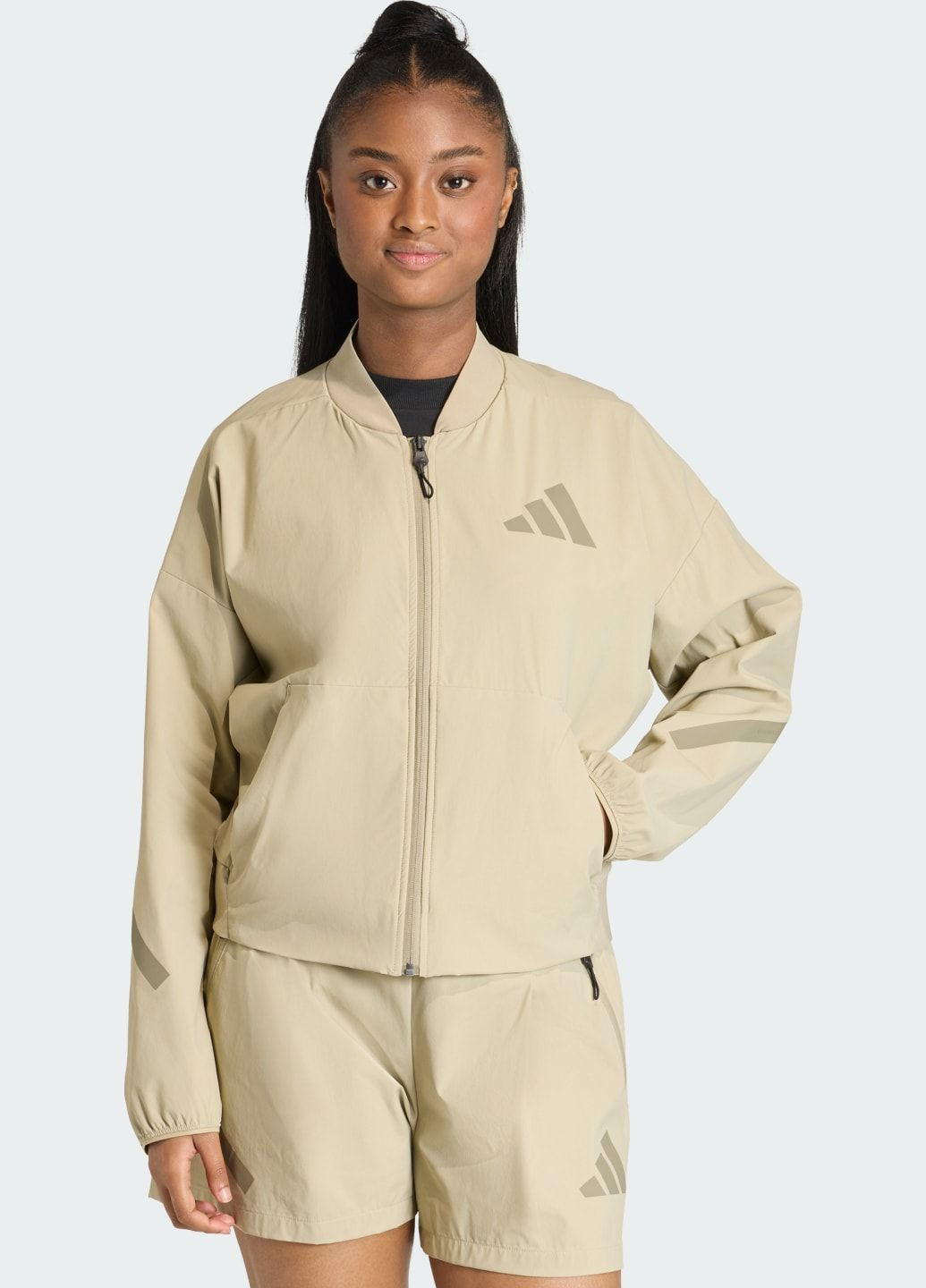 Коричнева демісезонна бомбер z.n.e. woven adidas