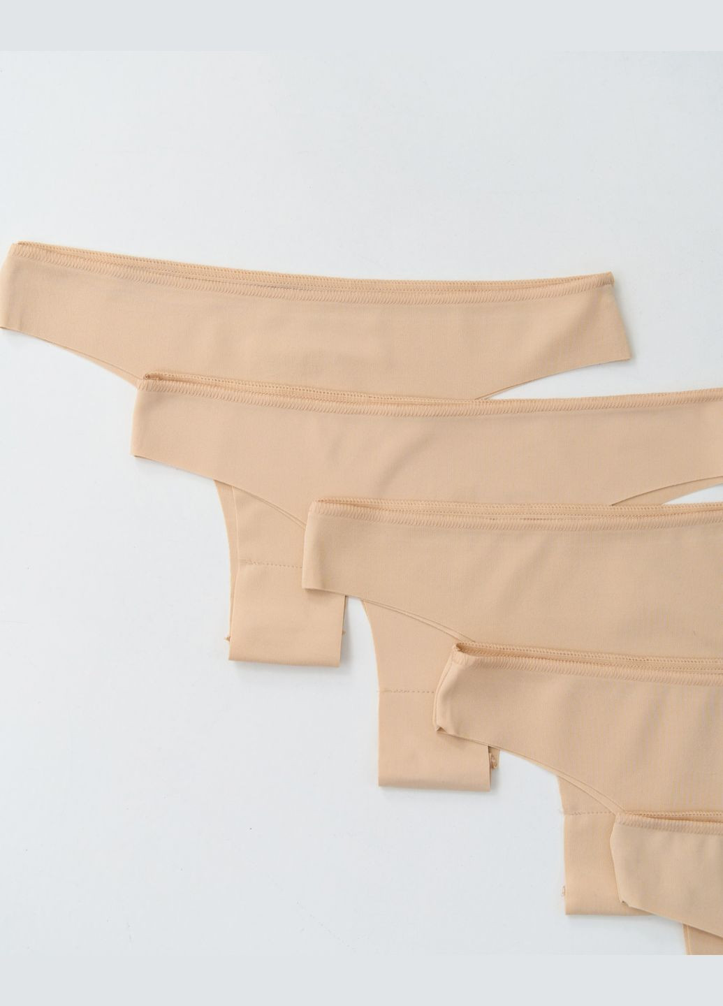 Жіночі трусики-бразиліани тілесні 5 шт. Nicoletta (322126965)