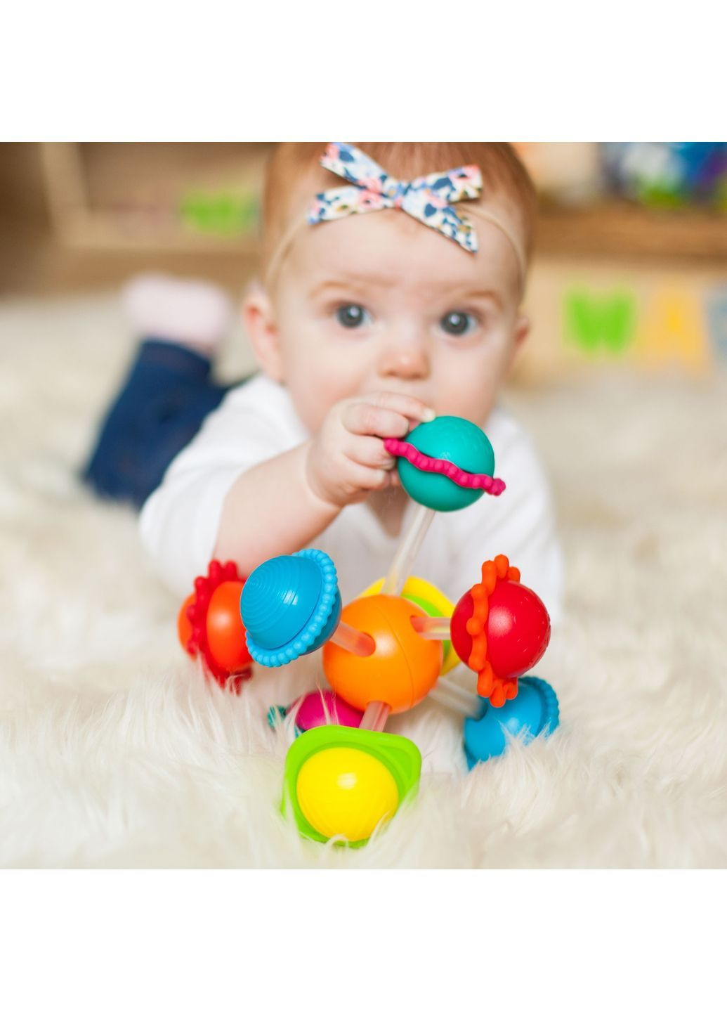 Игрушка-прорезыватель Wimzle Сенсорные шары () Fat Brain Toys F136ML (366725863)