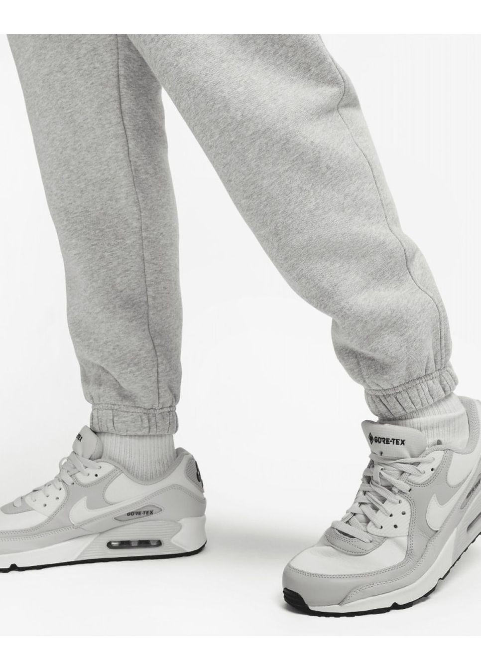 Серые демисезонные брюки Nike