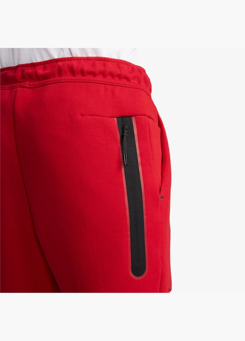 Красные демисезонные брюки Nike