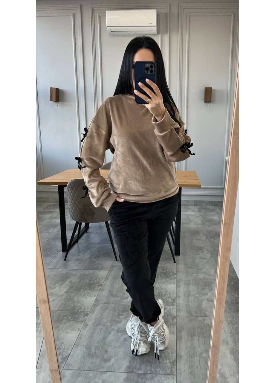 Стильний костюм для жінок з декоративними зав’язками на рукавах Україна (355803209)