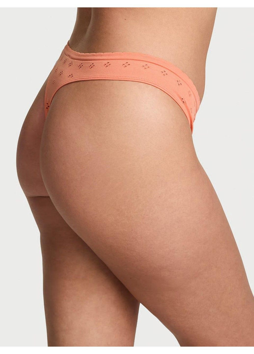 Трусики-стринги женские с микрофибры Seamless Eyelet Thong Panty персиковые Victoria's Secret (347723750)