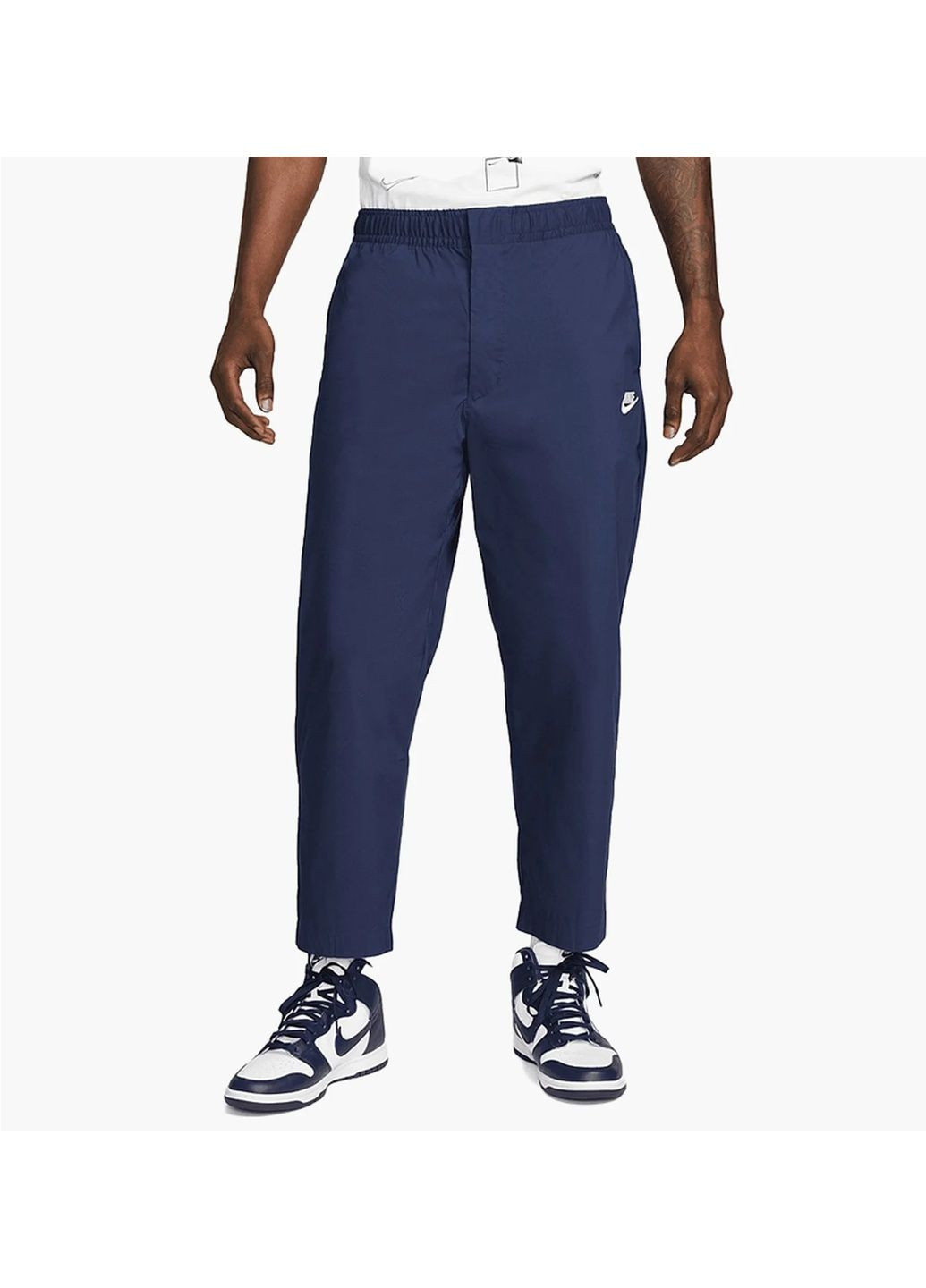 Синие демисезонные брюки Nike