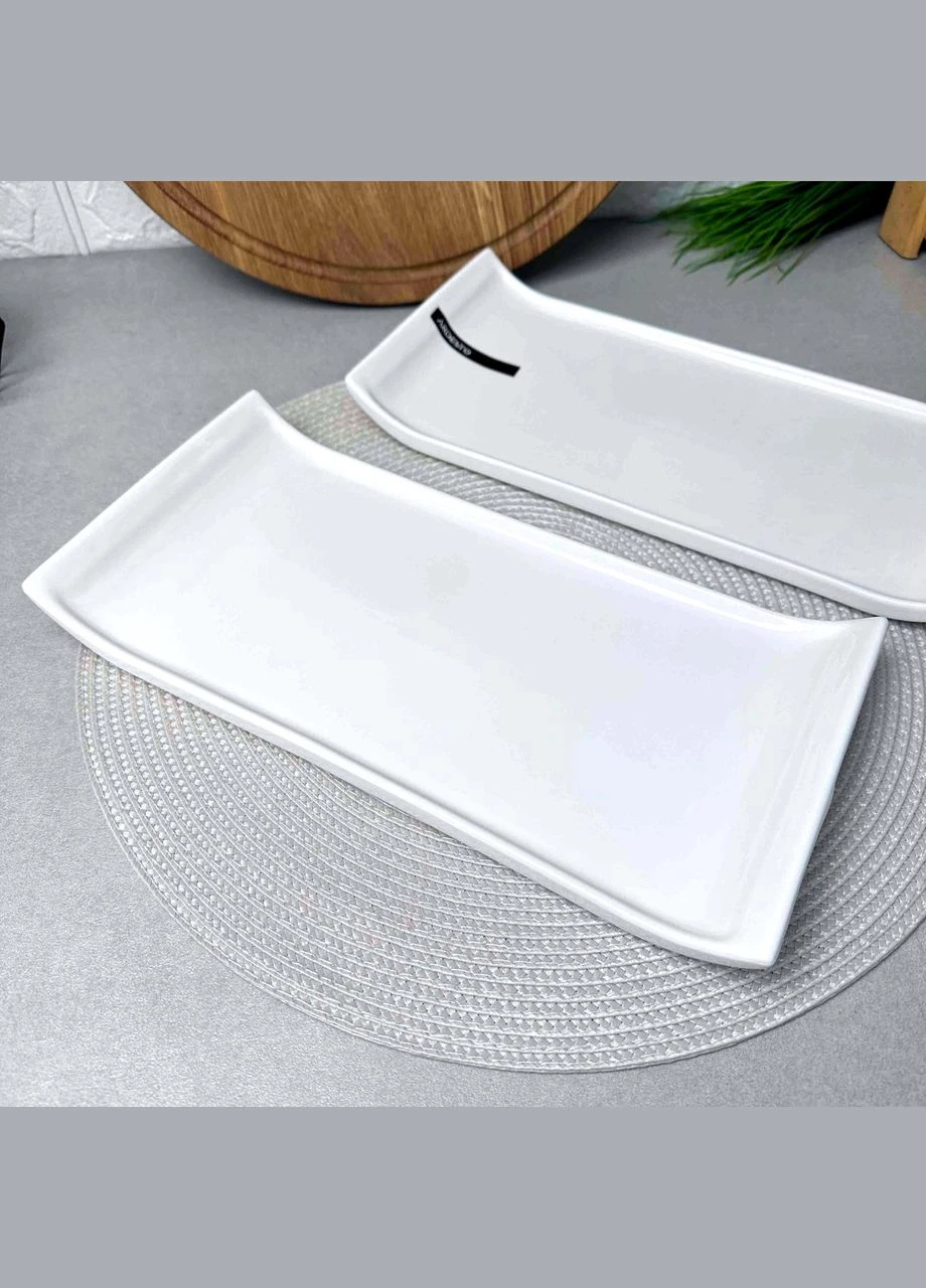 Белое плоское блюдо из фарфора 31*15 см. Plate Ardesto (303209978)