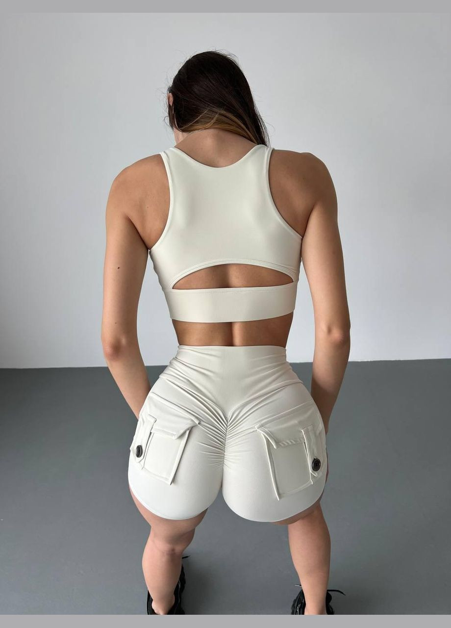 Спортивний костюм (топ з чашками та шорти з кишенями й пуш-ап ефектом), молочного кольору, розмір S Trends (330757712)