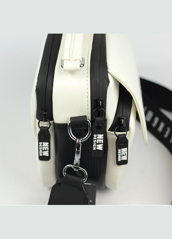 Чорно-біла жіноча маленька овальна молодіжна сумка крос боді через плече No Brand (290187040)