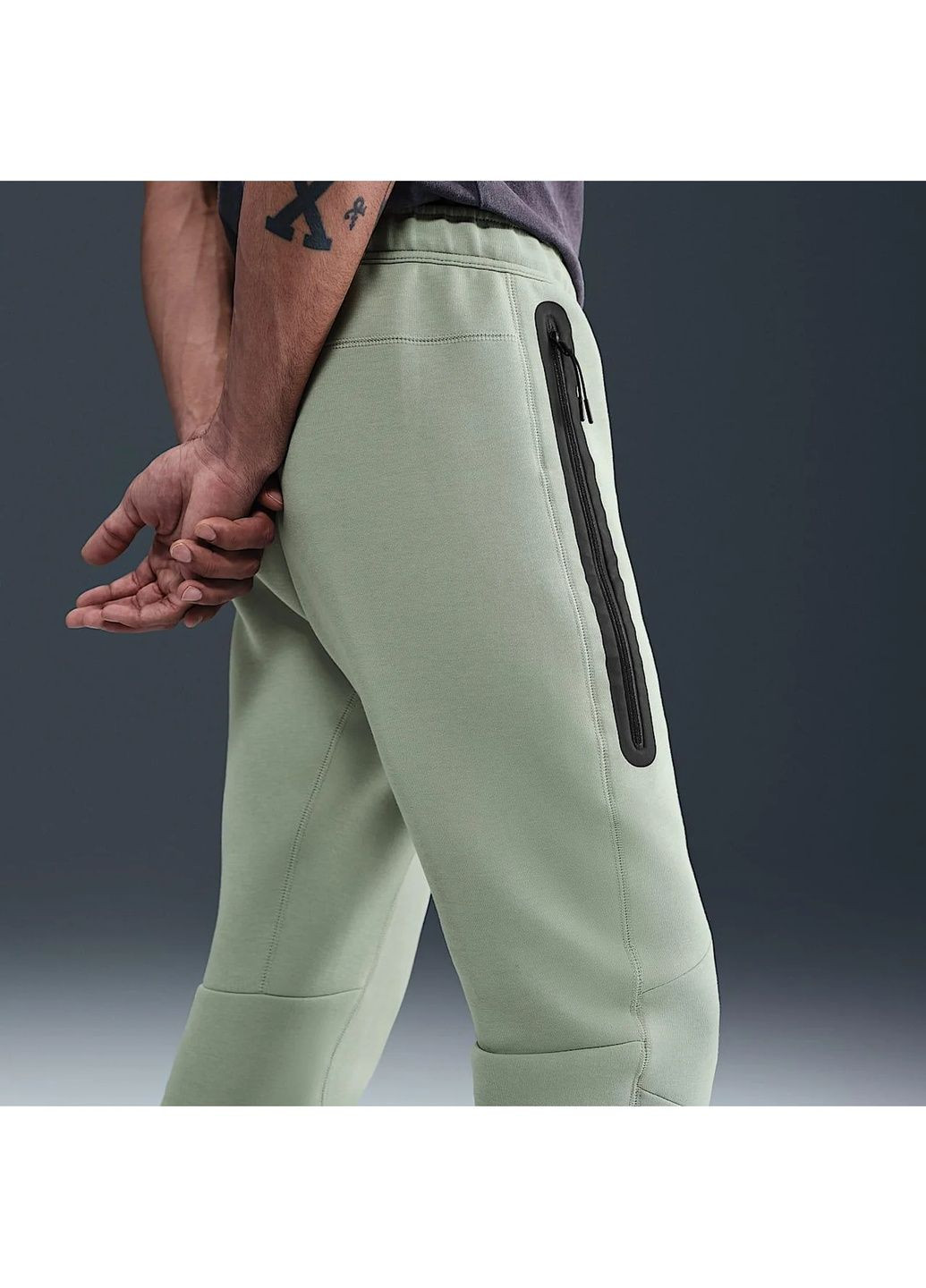 Оливковые демисезонные брюки Nike