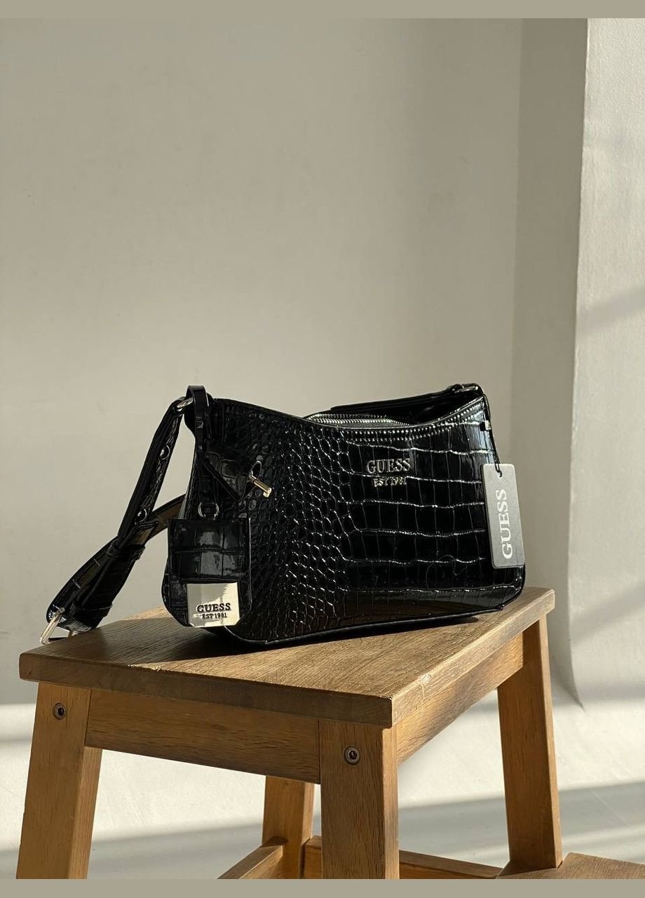 Жіноча сумка GUESS VG797919 багет через плече рептилія крокодил чорна No Brand (292582251)