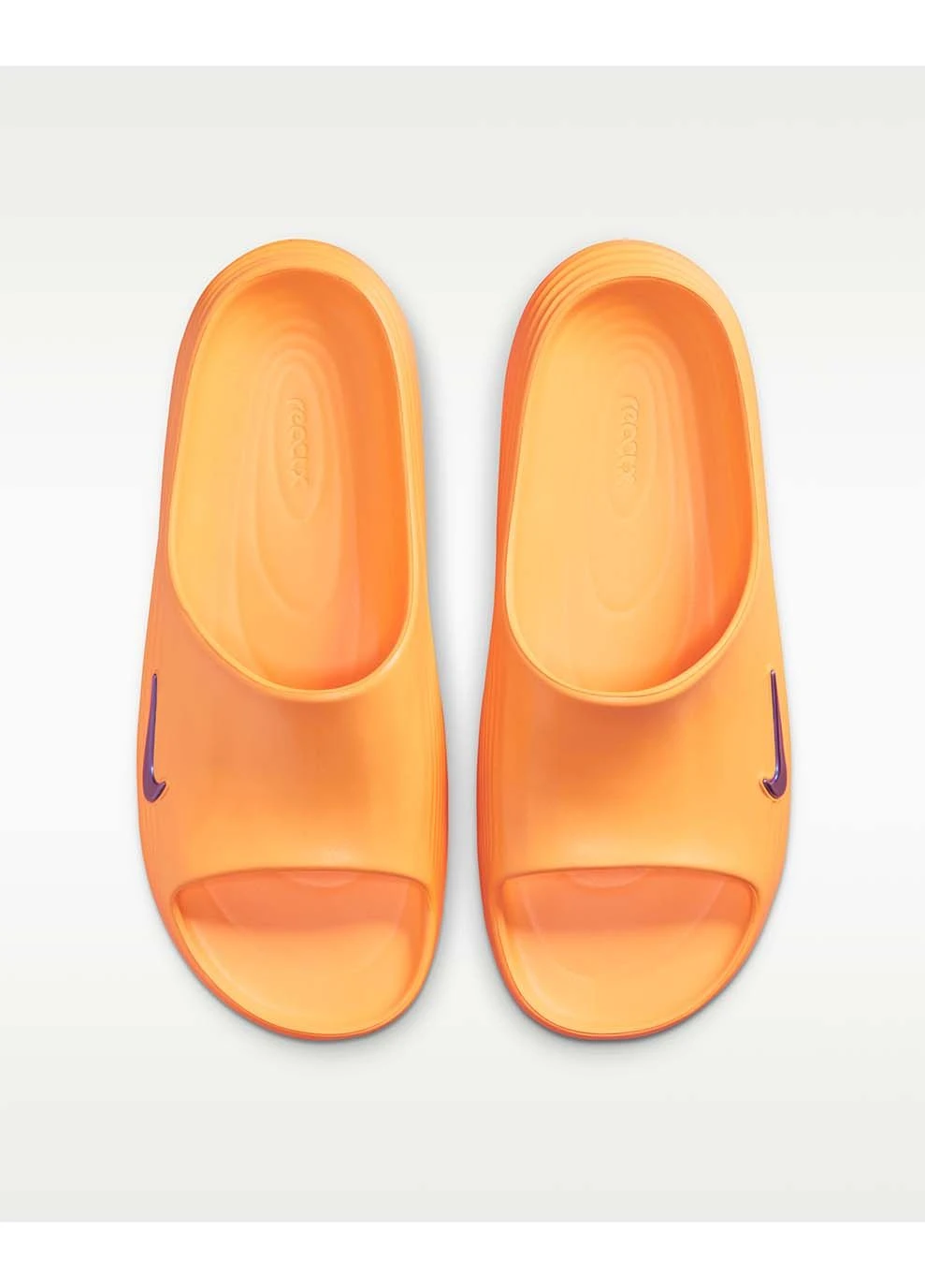 Оранжевые спортивные мужские шлепанцы reactx rejuven8 slide оранжевый Nike