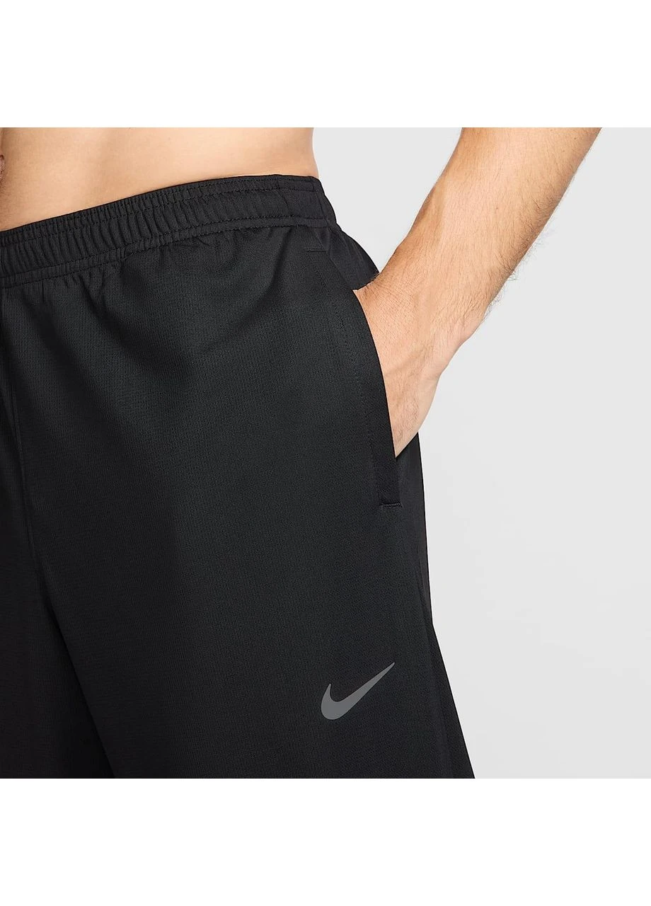 Черные демисезонные брюки Nike