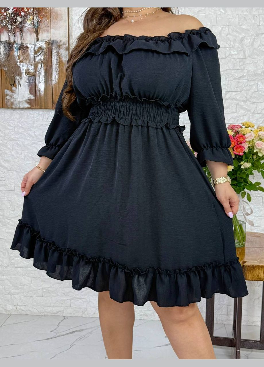 Чорна сукня цікавого крою Україна однотонна