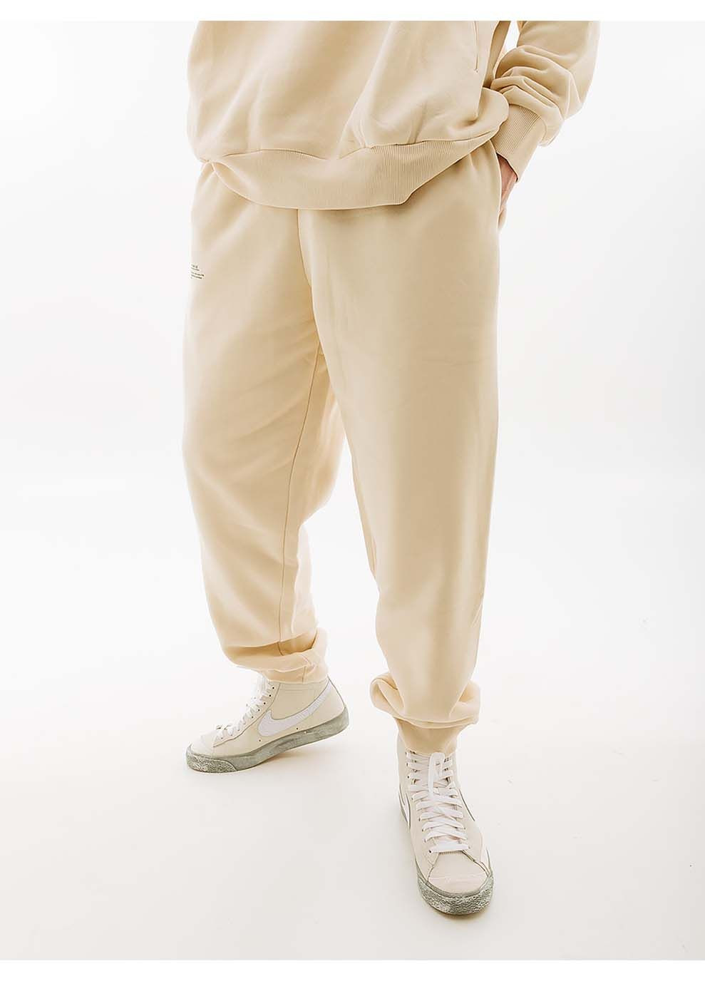 Бежевые демисезонные брюки Ellesse