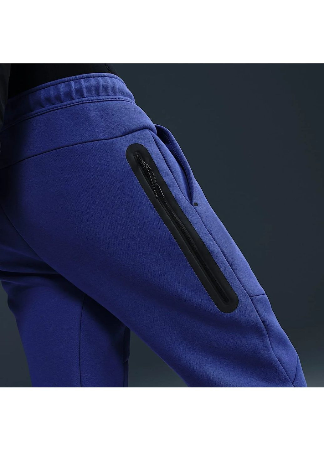 Синие демисезонные брюки Nike