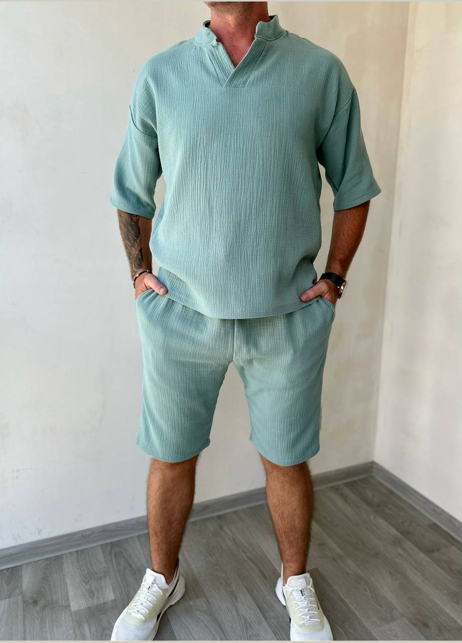 Оливковий літній костюм з шортами Garna