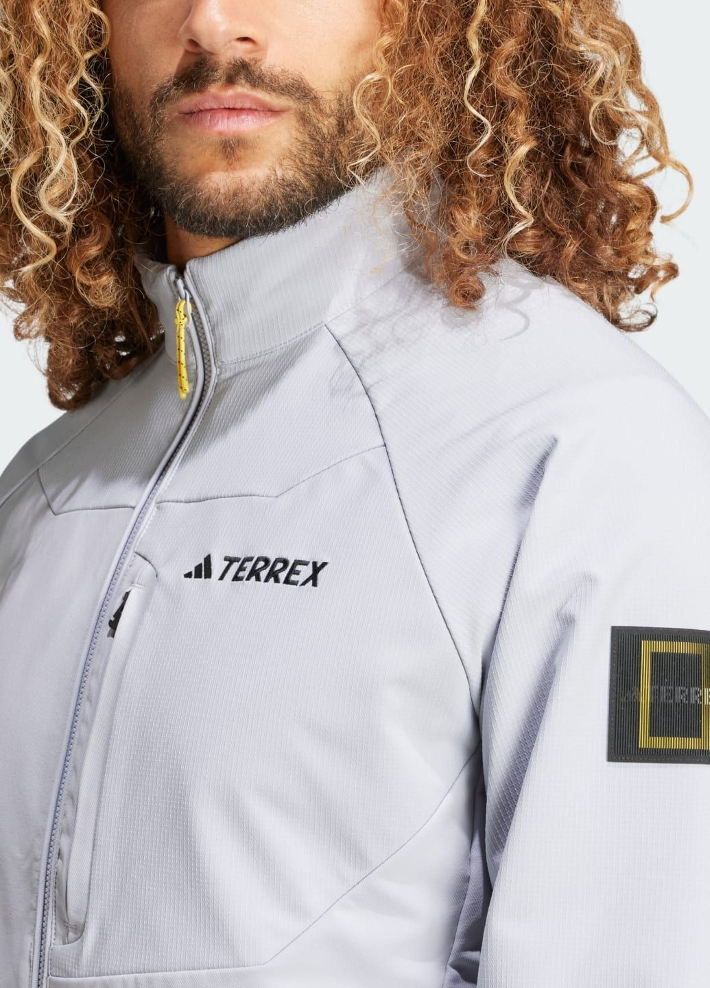 Сіра демісезонна вітровка national geographic softshell adidas