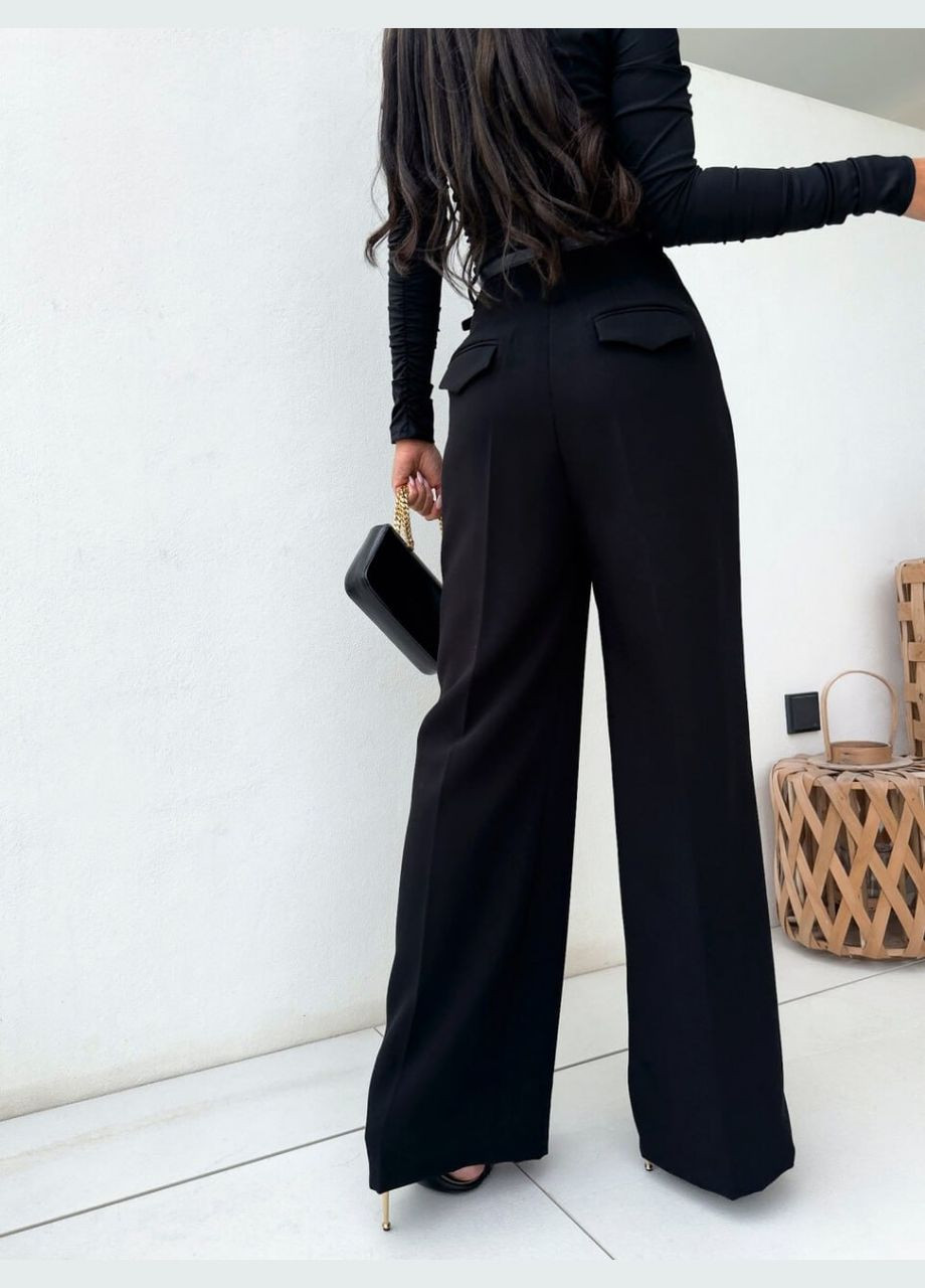 Жіночі штани палаццо колір чорний р.42/44 454141 New Trend (289477944)