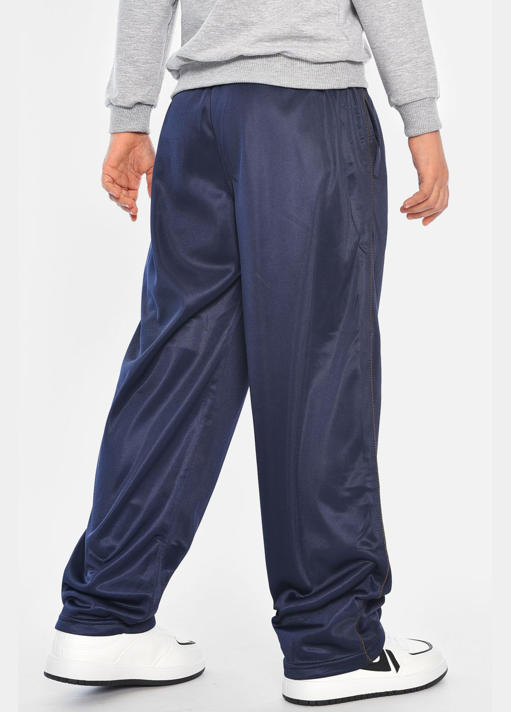 Спортивні штани підліткові для хлопчика на невеликому флісі синього кольору Let's Shop (316503298)