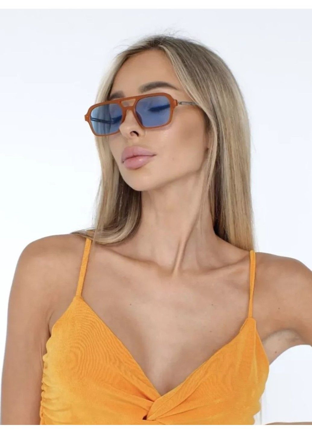 Сонцезахисні окуляри авіатор Celebrity з металевим завушником блакитні з помаранчевим No Brand (325889070)