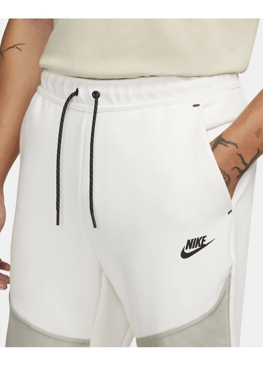 Белые брюки Nike