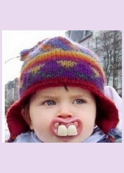 Ортодонтична силіконова соска-пустушка з зубками Два зубчики No Brand (307252395)